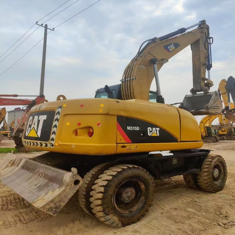 Escavadeira de segunda mão Original Cat M315D usou escavadeira de rodas de 15 toneladas com caçamba de 0,61m3