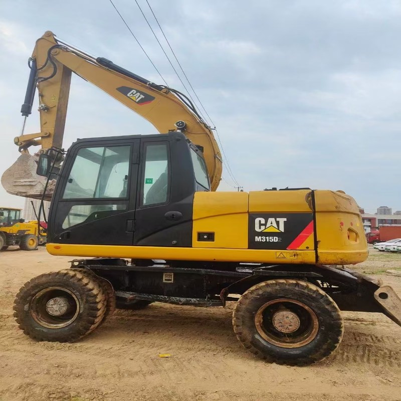 Escavadeira de segunda mão Original Cat M315D usou escavadeira de rodas de 15 toneladas com caçamba de 0,61m3